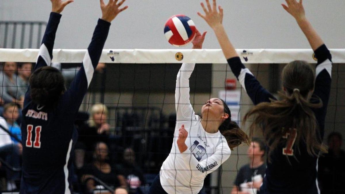 Clovis East's Brittany Olivares puts one down against Liberty in the CIF central section volleyball finals at West Hills College Saturday, Nov. 21, 2015 in Lemoore