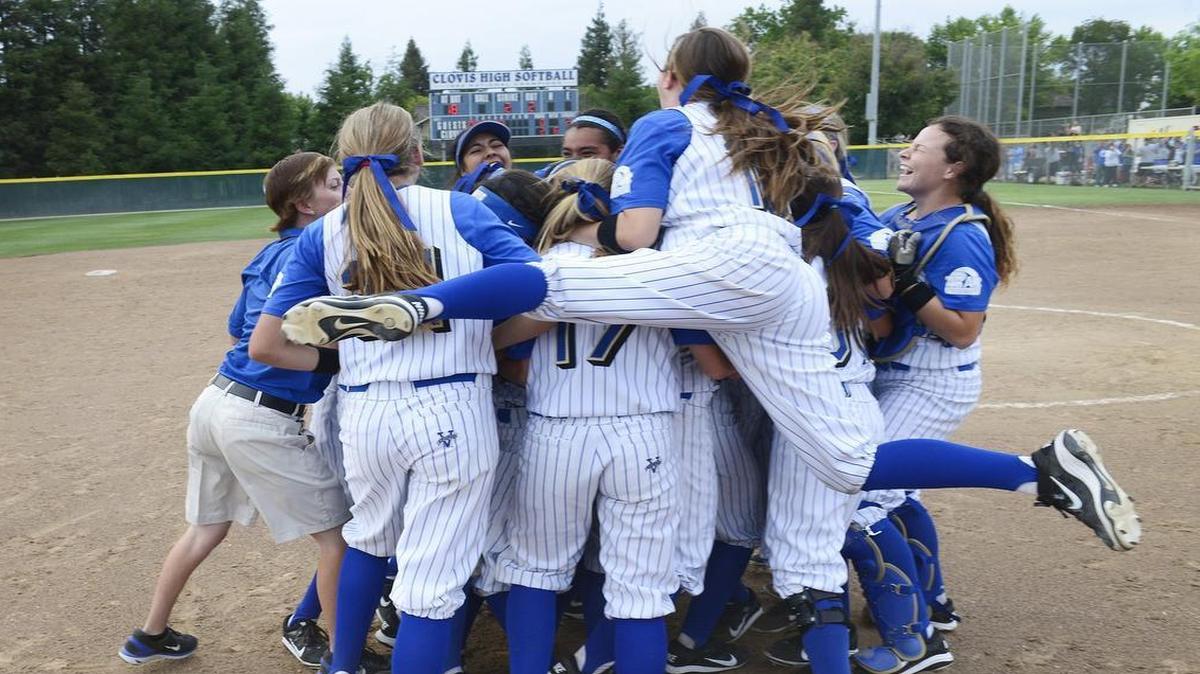 
Clovis players celebrate after beating Central 2-0 to win the Central Section Division I softball championship Thursday.
