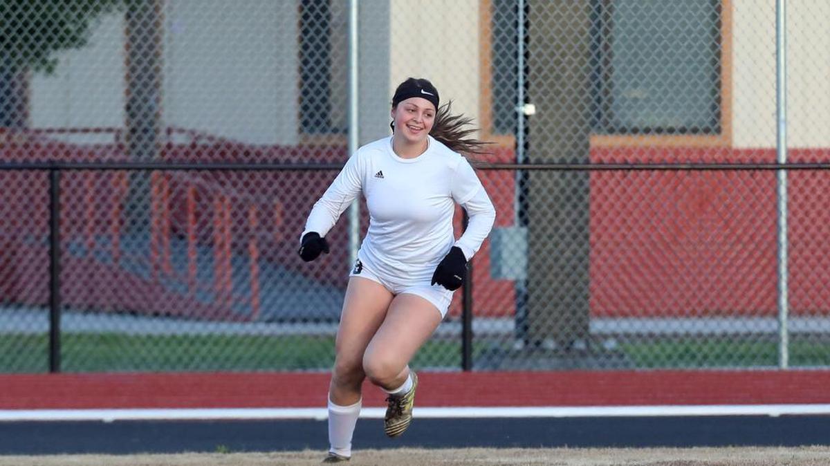 Washington Union senior striker Sydney Kuma celebrates a goal in the fourth minute of play – and added another second-half-goal on a header – to help her team to a 2-0 win Monday over Orosi.