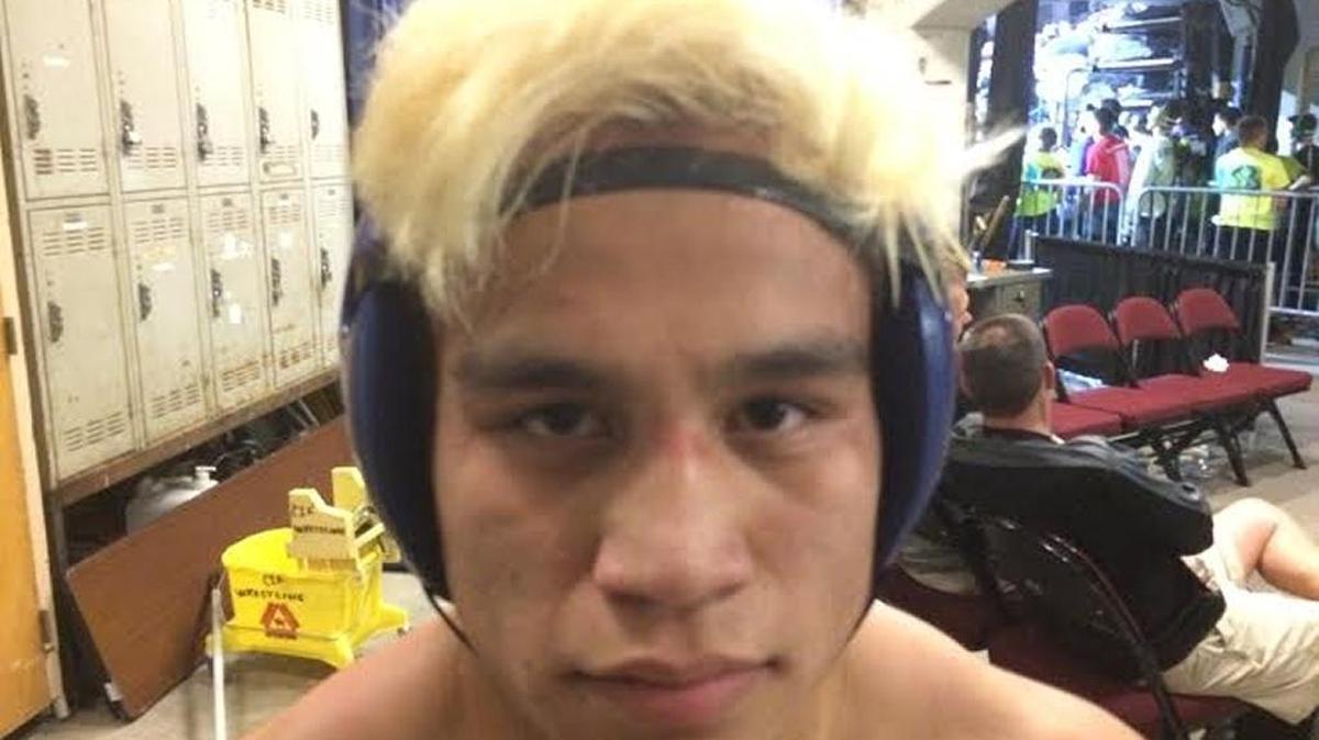 Clovis’ Justin Mejia, the 120-pound state wrestling champion.
