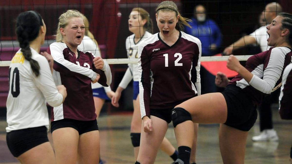 From left, Sierra High’s Alex Smith, Jordan Falk, Hayly Day and Kinlee Rix celebrate a point against Dos Palos in their Central Section Division IV girls volleyball semifinal Tuesday, Nov. 17, 2015. Falk had 12 kill as the Chieftains swept the Broncos to advance to the final on Saturday.