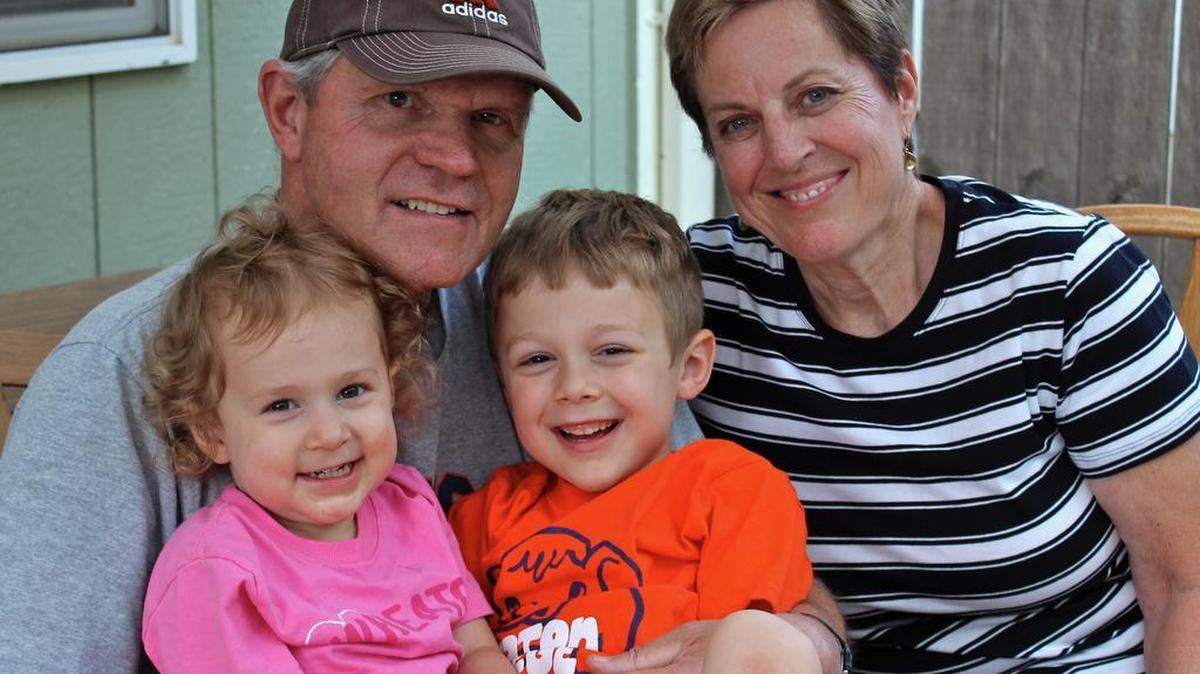 Longtime Immanuel coach Mark Hayward, who died Sunday after a 10-year battle with cancer, is surrounded by his wife, Gail, and two of his three grandchildren (Penny and Oliver). Mr. Hayward guided the Eagles to eight Central Section championships in girls volleyball and six section titles in boys tennis.