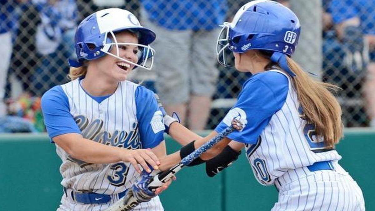 Cayla Broussard, left, and Lyndsay Hathaway helped Clovis capture the Central Section Division I softball title last season before an overflow homefield crowd estimated at 1,000. The section voted Wednesday to move all championship softball games to Fresno State’s Margie Wright Diamond for the next two seasons.