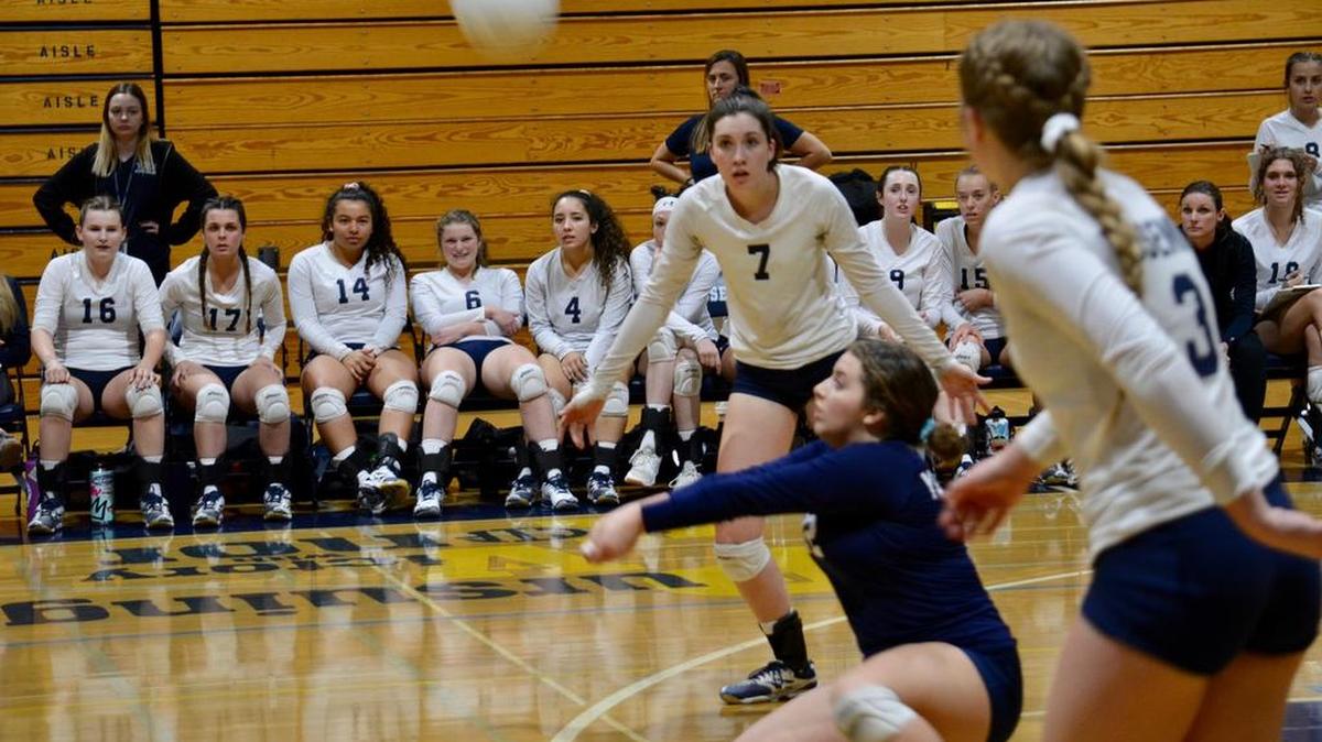 Yosemite High’s Izzy Peter digs while Sayda Taylor (7) and Chloe Duke (3) are ready to assist during the Badgers’ regional first-round victory Tuesday night over visiting Kelseyville.