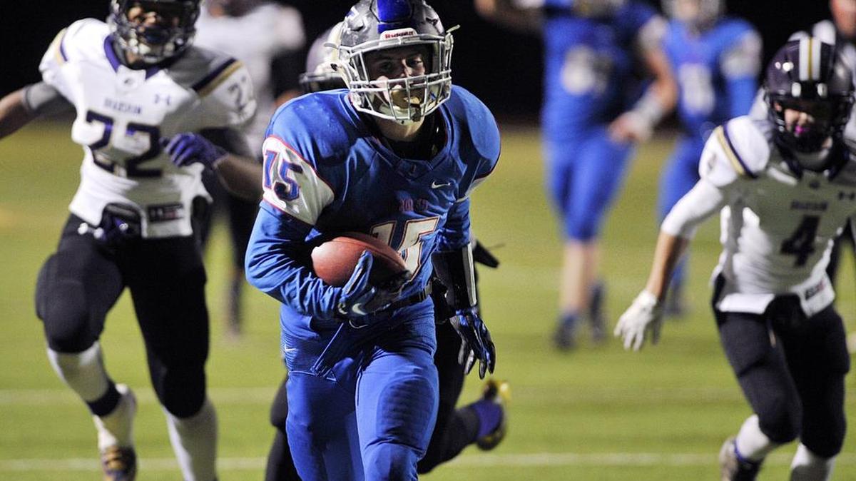 Immanuel’s Ryan Case (C), center, runs for touchdown in the second quarter of the CIF Northern Regional Division V-AA football bowl against Bradshaw Christian on Friday night, December 11, 2015 in Reedley, Calif.