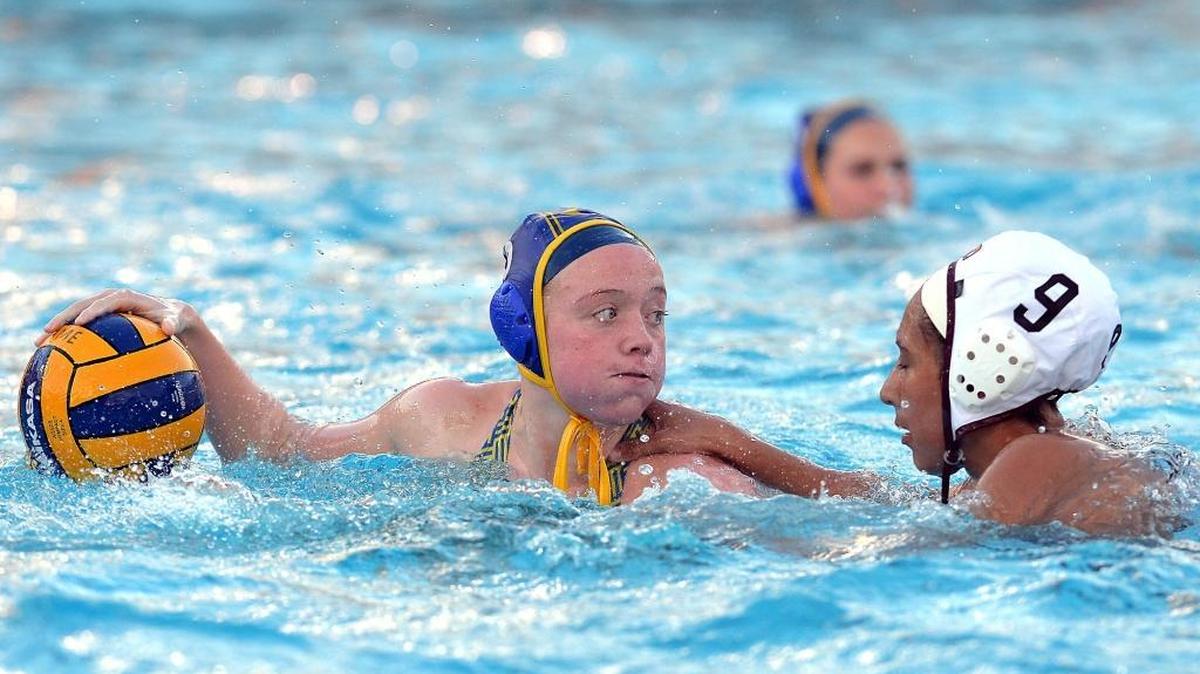 Clovis High’s Jillian Hatch looks to pass against Clovis West’s Annabelle Magdaleno during a Tri-River Athletic Conference match. The rivals earned the top seeds for the 2015 Central Section Division I playoffs, with Hatch and the Cougars the No. 1 a year after then top-seeded Clovis West beat No. 2 Clovis 5-4 in the final.
