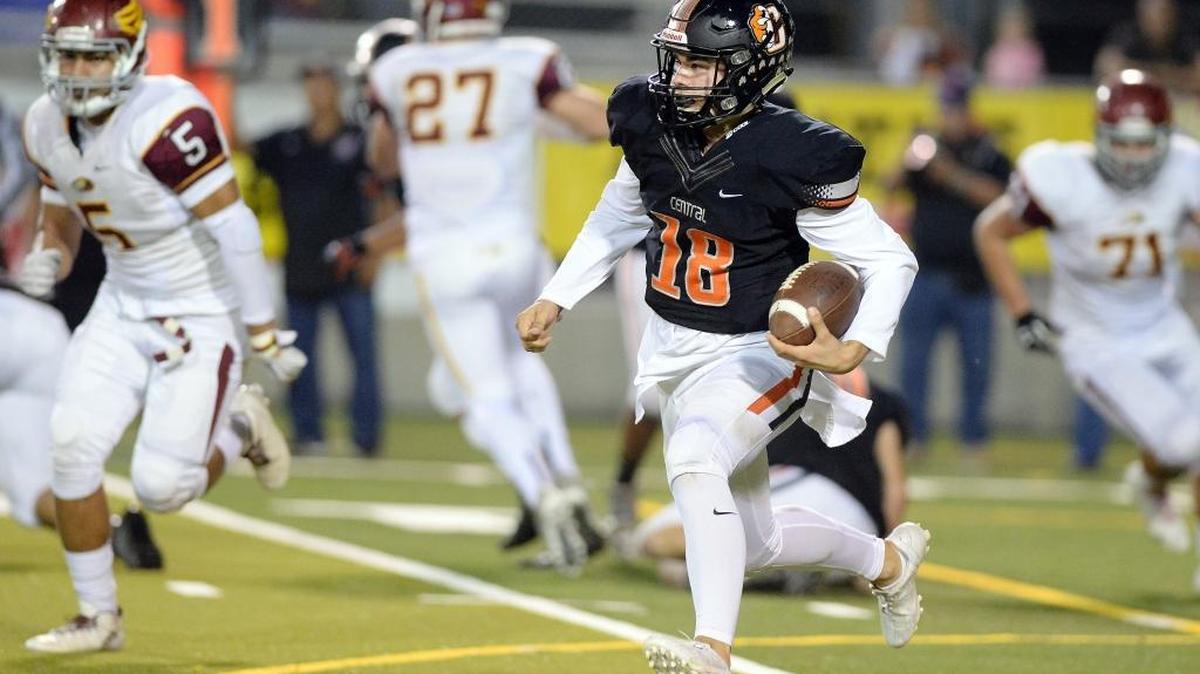 Central High quarterback Trent Tompkins runs a keeper against Clovis West in their Tri-River Athletic Conference game at Central on Friday, Oct. 28, 2016. The teams meet in 2017 on Thursday, Oct. 26.
