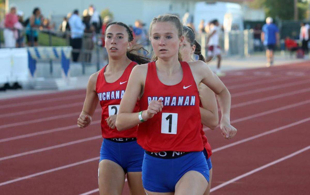 Buchanan High senior Caroline Mendyk took first in 11:00.78 in the girls 3,200-meter race at the Sanger Metric Classic on April 21, 2023.