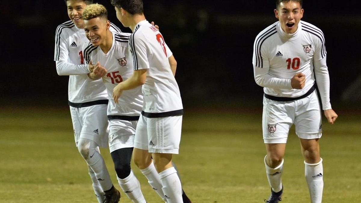 Ronnie Griffin (No. 15), Juan Flores (No. 10) and McLane High finished second in the Boys Premier A division of the rescheduled and reconfigured Garces Holiday Soccer Festival.