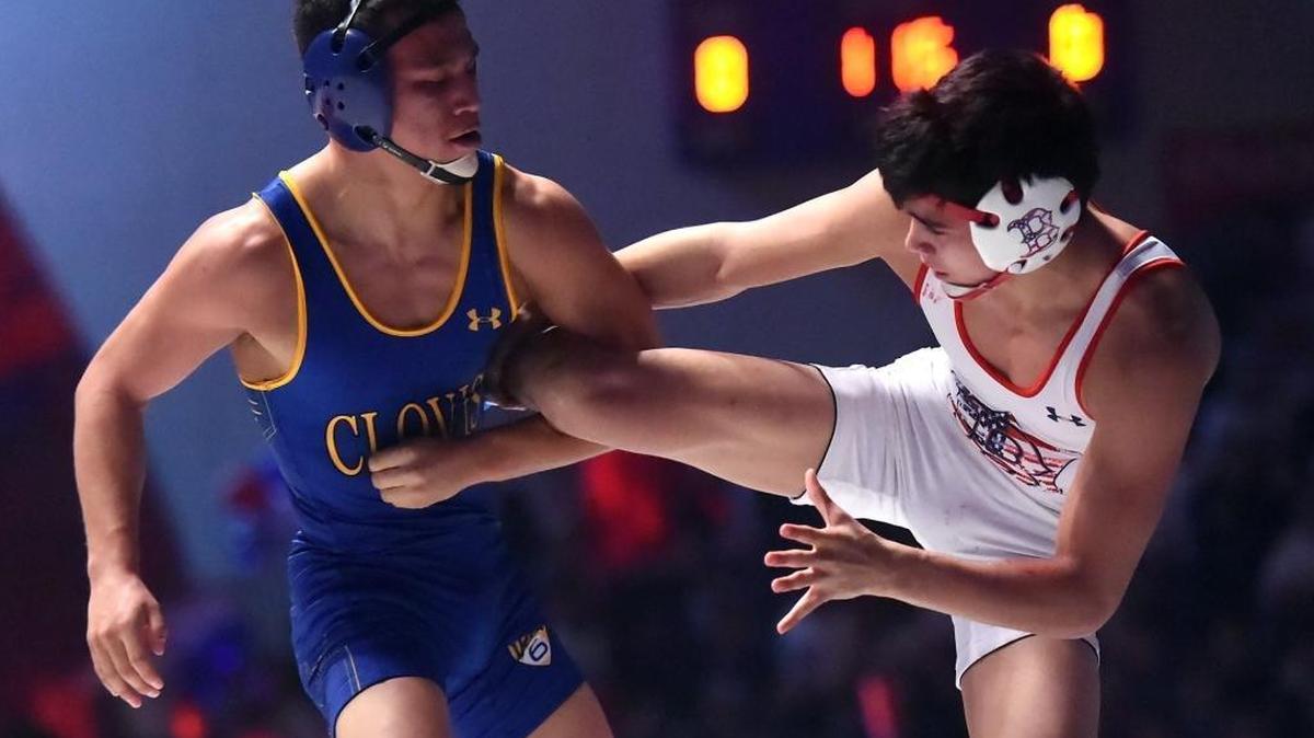 Clovis 126-pounder Justin Mejia, left, is out to become the second four-time champ in the history of the CIF State Wrestling Championships, which begin for the 45th time on Friday at Bakersfield’s Rabobank Arena.