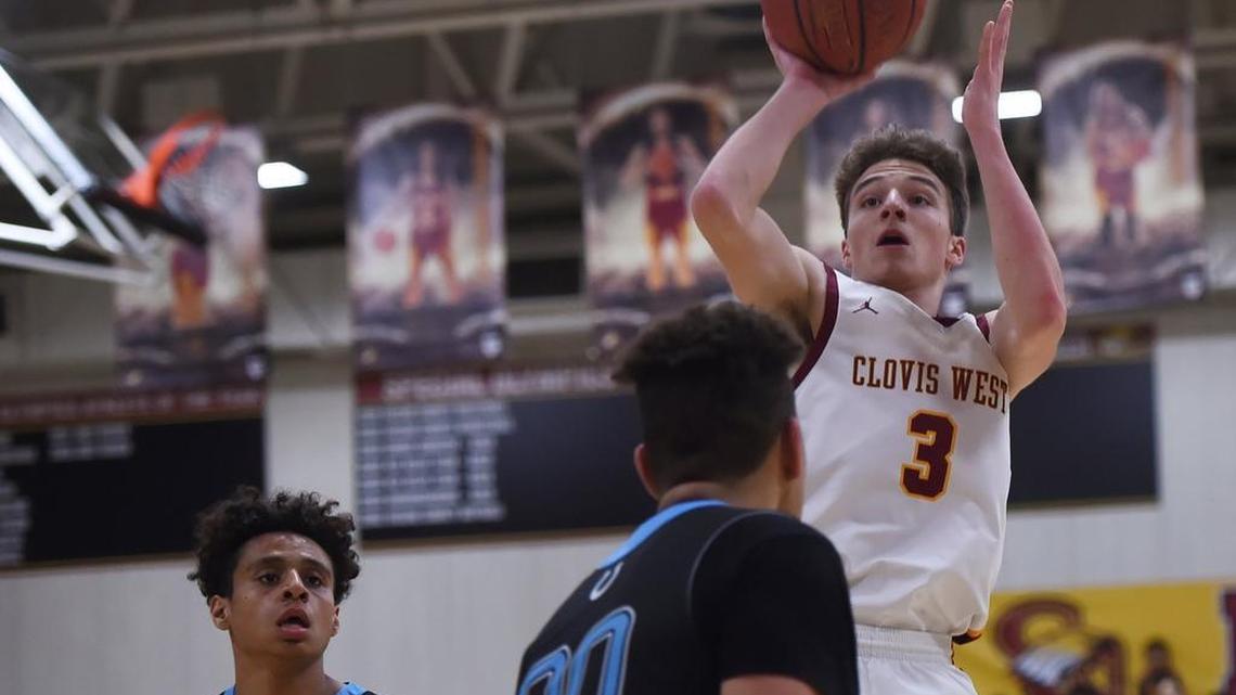 Clovis West’s Cole Anderson, right, makes a shot in a 2019 game. Anderson is the school’s career scoring leader.