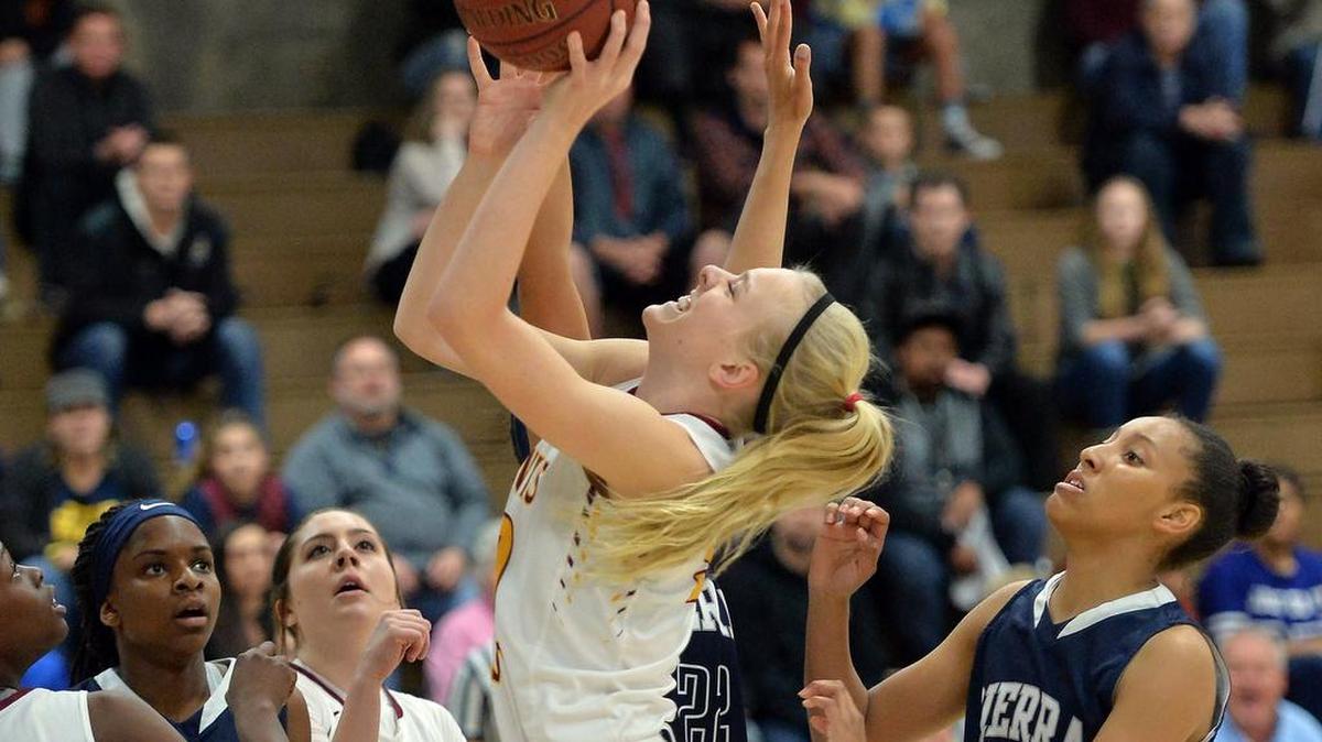 Clovis West’s Megan Anderson goes up for two against Sierra Canyon’s Alexis Griggsby, right, in the Southern California Open Division girls basketball quarterfinals on Friday, March 11, 2016, at Clovis West High School in Fresno.