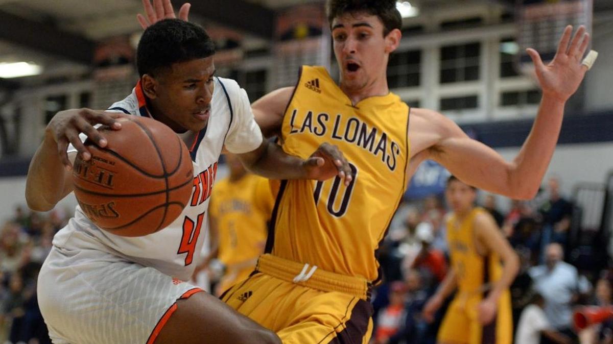 San Joaquin Memorial’s Jalen Green, left, powers past Las Lomas’ Tanner Wallace in a 2017 Division 5 Northern California Regional boys basketball first-round playoff game. Green helped the Panthers to a 26-7 record last season and has received offers from Duke and North Carolina. He is ranked as the No. 1 recruit in the Class of 2020 by Rivals.com.