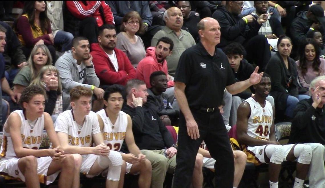 Clovis West coach Vance Walberg gives instruction during the championship game of his school’s Nike Invitational boys basketball tournament The Golden Eagles defeated Central 81-66 on Saturday, Dec. 16, 2017.