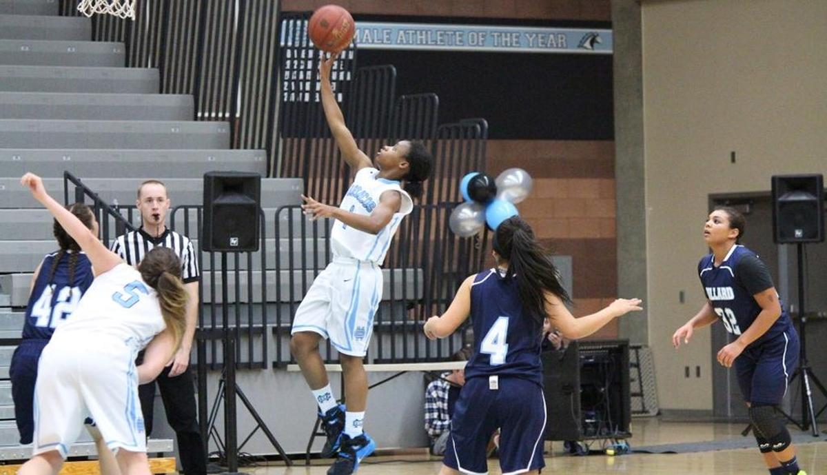 Clovis North junior point guard Taylor Pilot makes a layup against Bullard.