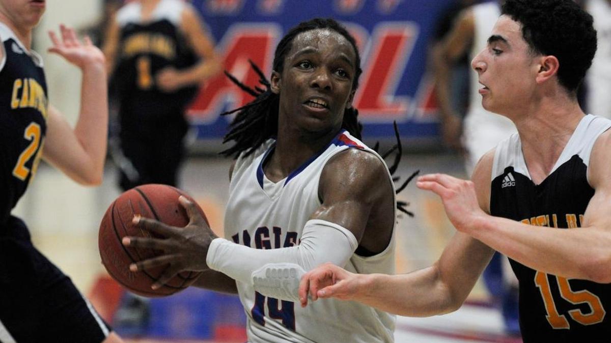 Immanuel’s Colin Slater, center, was among 755 senior boys and girls nation-wide who made the nominations list for the McDonald’s All American Games.