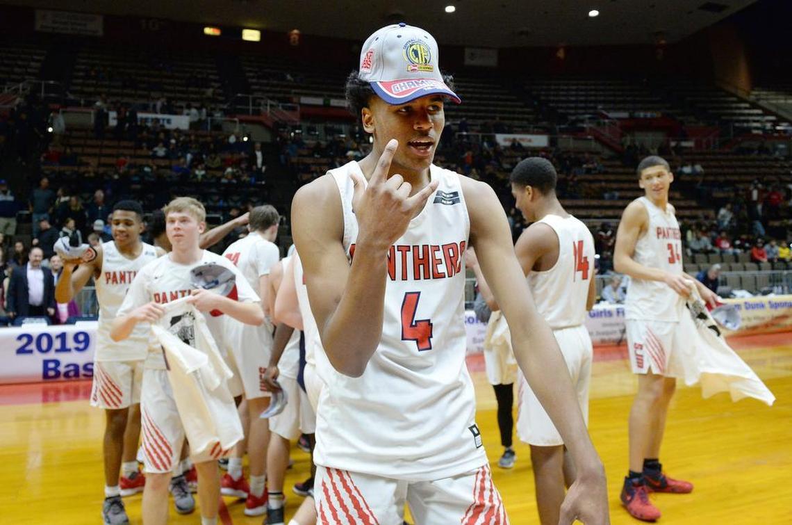 San Joaquin Memorial’s Jalen Green celebrates with the team after defeating San Luis Obispo for the Central Section Division II boys basketball championship at Selland Arena in Fresno on Friday, Feb. 22, 2019.