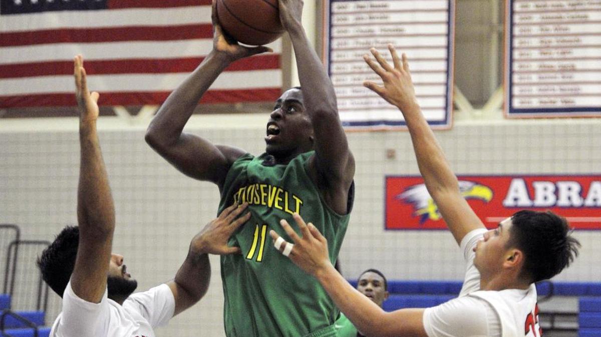 Roosevelt’s Bryson Williams, a Fresno State-bound center show shooting against Kerman on Jan. 5, 2016, has the Rough Riders ranked 11th overall by The Fresno Bee in the Central Section and No. 1 in Division III.
