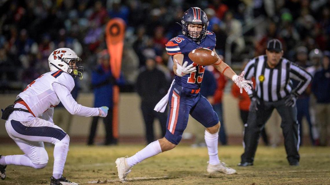 San Joaquin Memorial’s Mac Dalena, a Fresno State recruit, bobbles the ball before catching it and running it in for a touchdown against Tulare Western during their Division II Central Section championship football game at San Joaquin Memorial on Friday, Nov. 29, 2019.