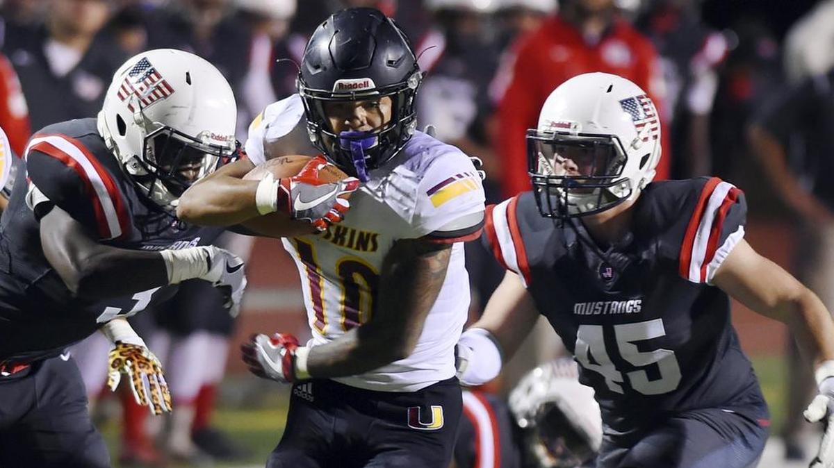 Tulare Union High running back Kazmeir Allen scored three more touchdowns to break the CIF State single-season record and run his total to 66 as the top-seeded Tribe beat No. 4 Garces 42-12 in a Central Section Division II semifinal Friday, Nov. 17, 2017.