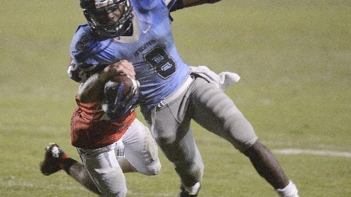 
Bullard High’s Charles Williams dodges a tackle en route to a touchdown in the final seconds of a 2014 game. Williams picked up college offers last week from UNLV, Washington State and Wyoming.
