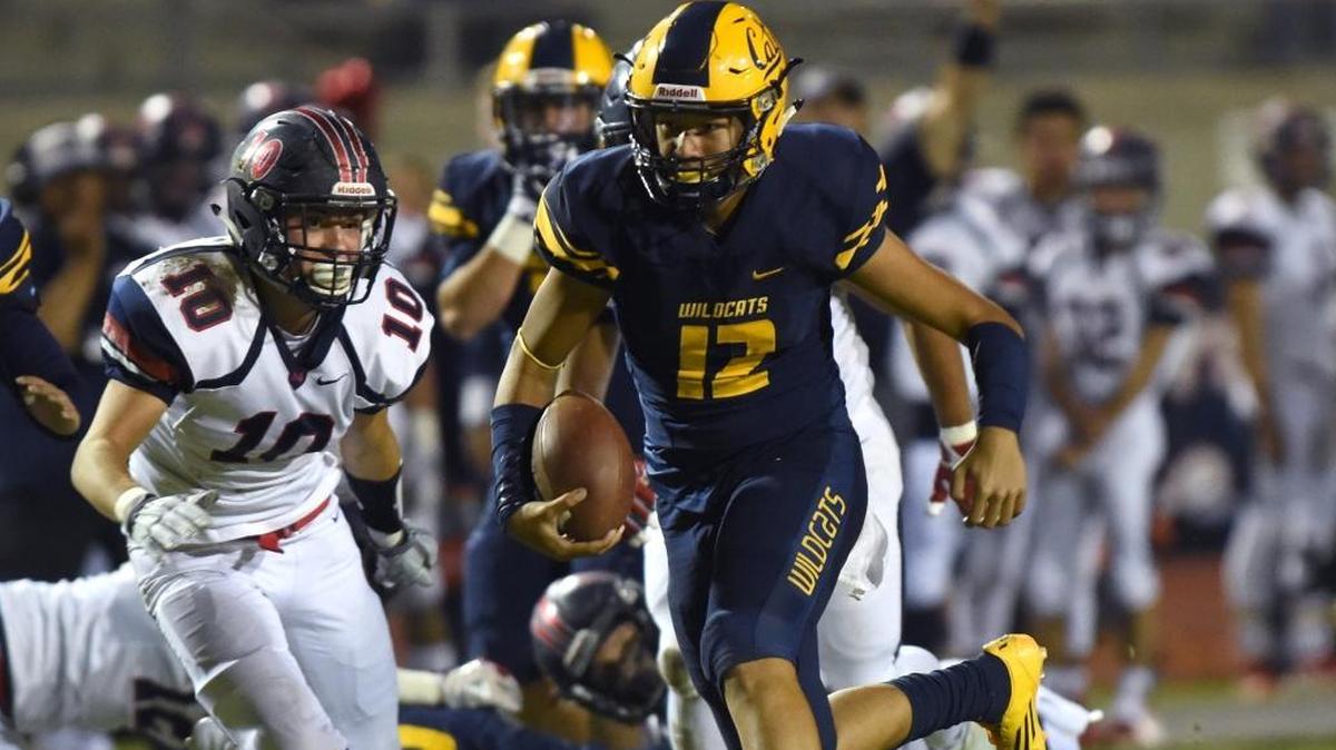 Sunnyside quarterback Donovan Kong runs for a touchdown in a September game against San Joaquin Memorial.