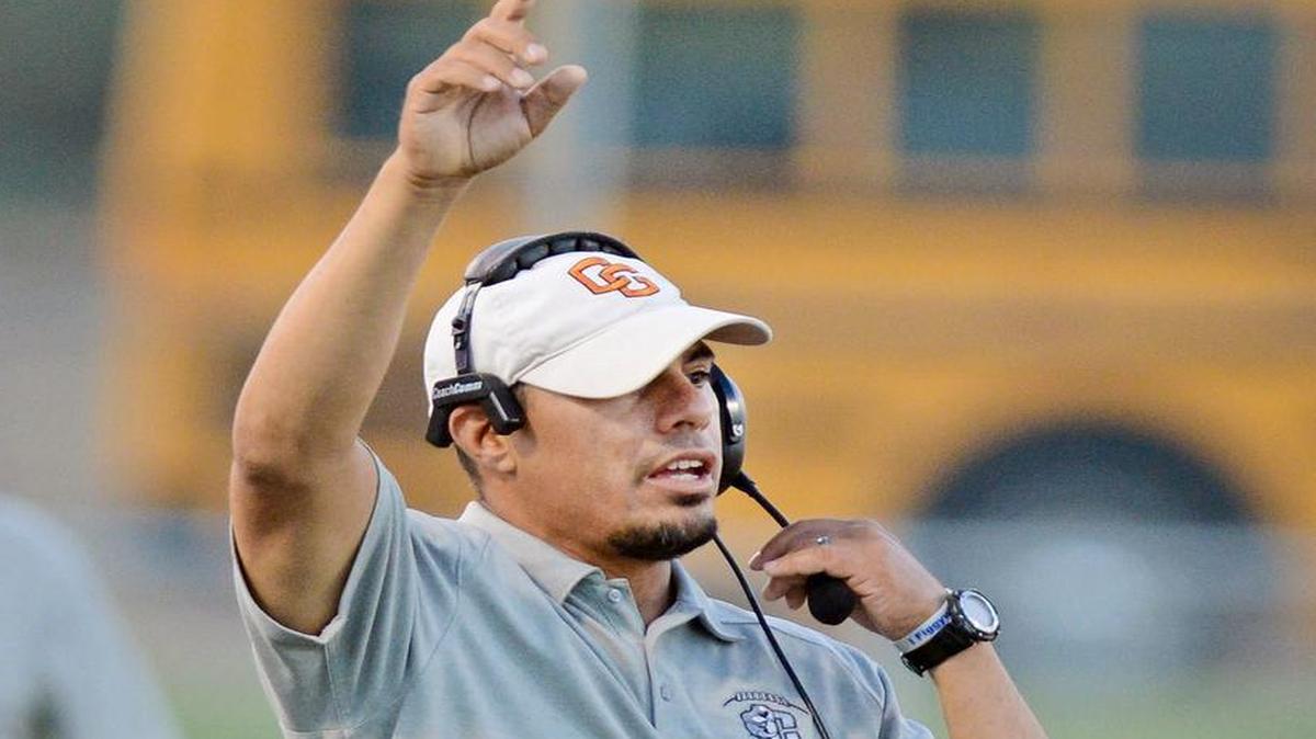 
Central’s Justin Garza, pictured coaching one of his five football games last season, has returned to Stanford Medical Center as his four-year battle with cancer has worsened.
