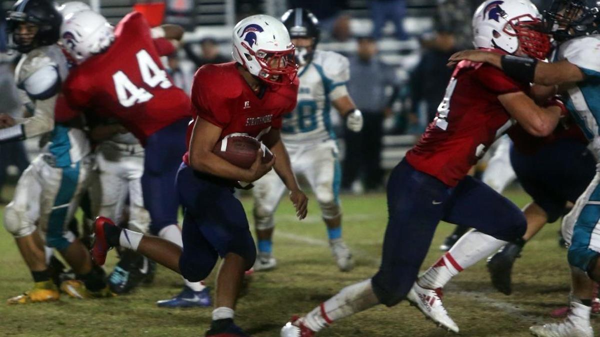 Joseph Garcia, in action in the 2016 state championship game, scored five touchdowns Friday night, Dec. 8, 2017 to lead Strathmore past St. Patrick-St. Vincent-Vallejo 49-35 and back to the state championship game.