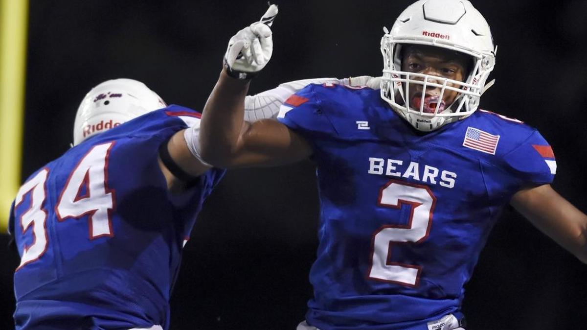 Buchanan’s Kendall Milton, right, and Luke Malloy, celebrating a regular-season touchdown, had a lot more to celebrate Friday night, Nov. 24 – the Bears beat Clovis West 30-28 to advance to the Central Section Division I championship game.
