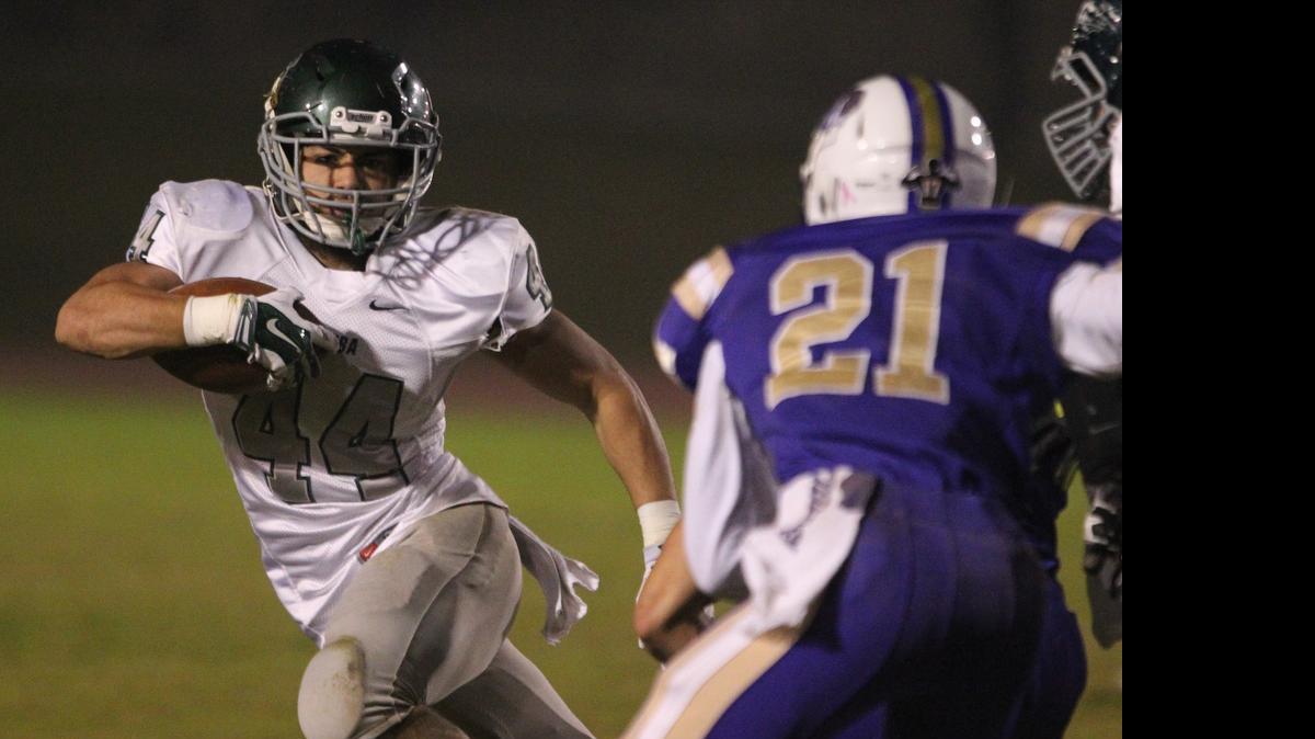 
Former Dinuba High running back Michael Wright, left, will play safety and special teams as a preferred walk-on (essentially a recruit without a scholarship) at Sacramento State. Wright rushed for 5,134 yards, the 16th-best total in Central Section history, during his four-year career.

