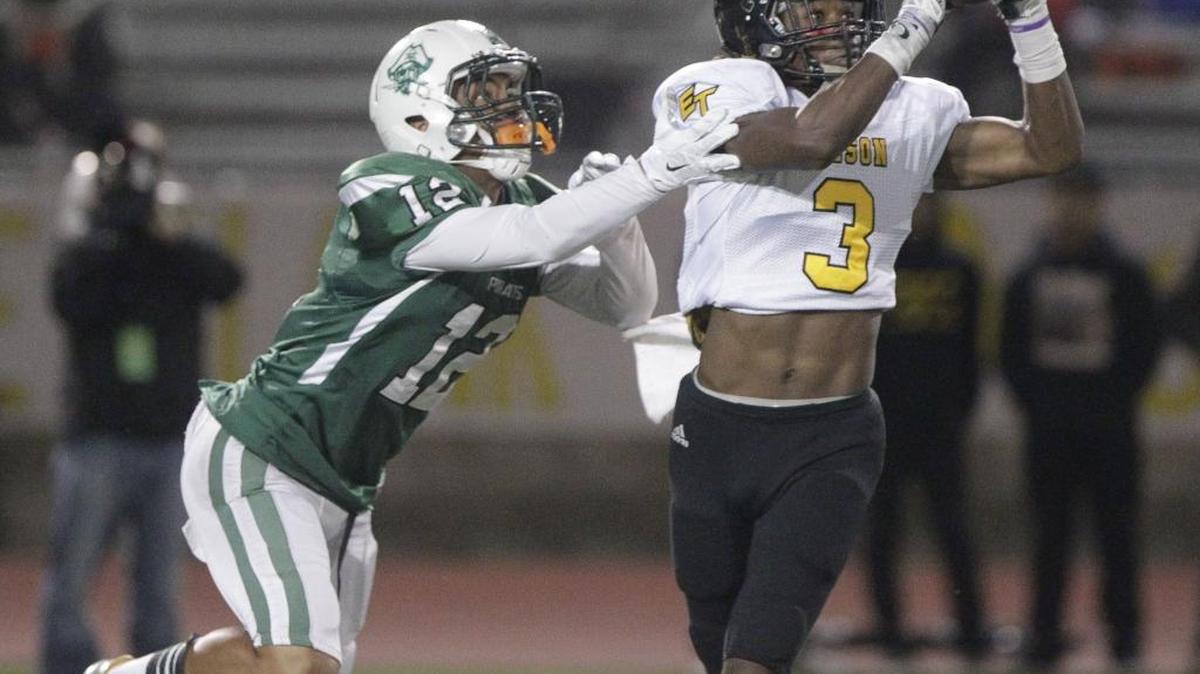 
Edison High’s Tyler Horton intercepts a pass intended for Oceanside’s Malavai Taylor in the second quarter of the 2014 SoCal Division I Regional at Oceanside. Horton and the Tigers won the Central Section Division I championship a year ago and advanced to the regional bowl game, but begin this year at No. 6 in the section behind preseason No. 1 Clovis.
