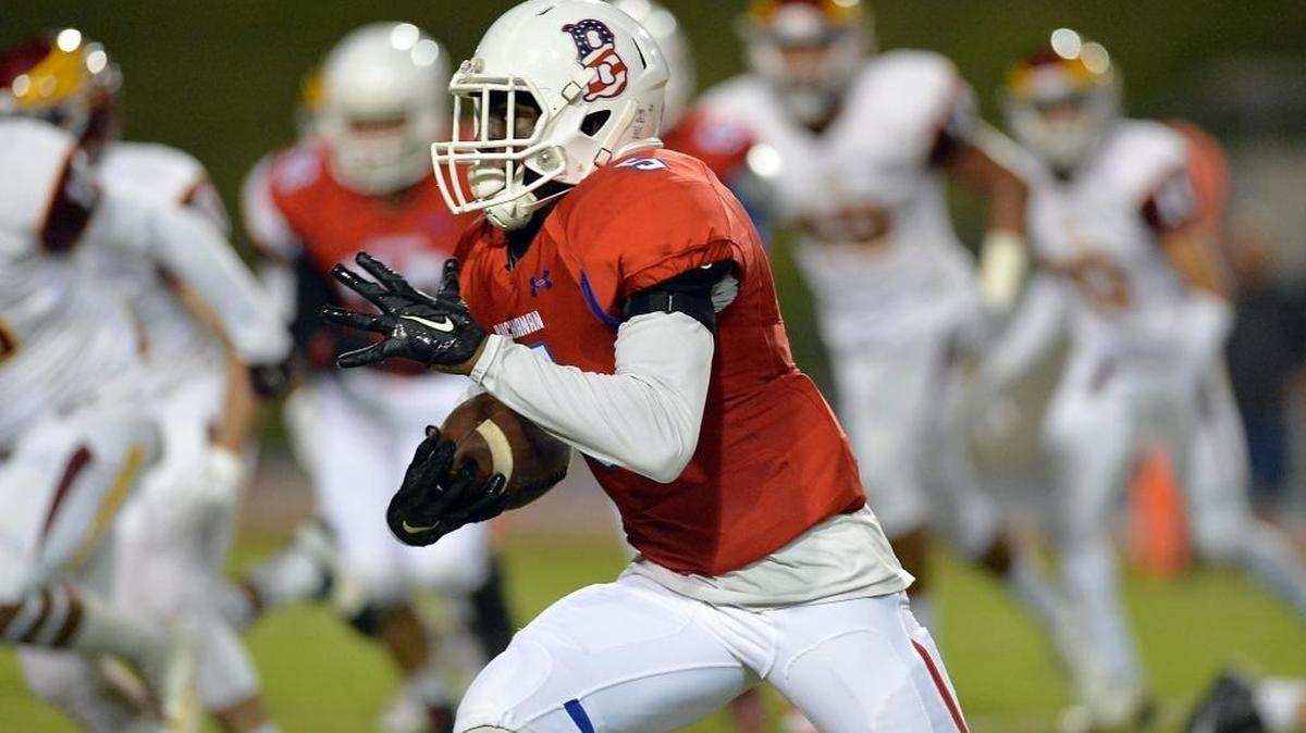 
Buchanan’s Chibuikem Dunu rips off a 12-yard touchdown run in the first quarter.


