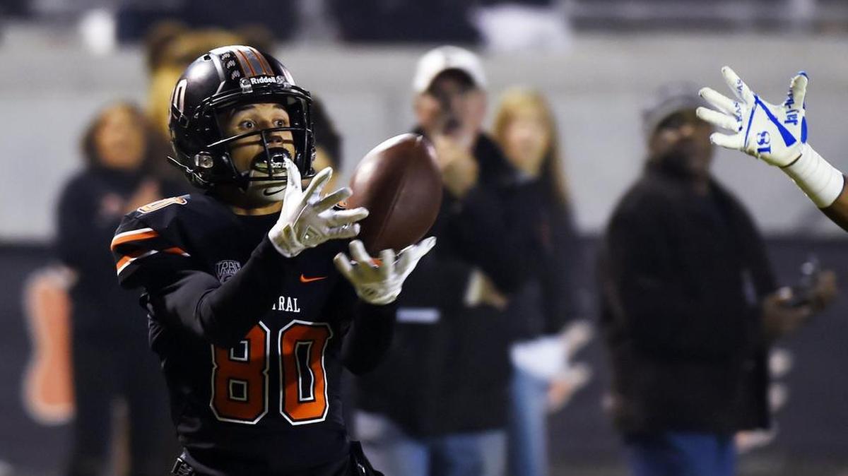 Central High receiver Manuel Oliver-Davis hauls in the first of four touchdowns from quarterback Trent Tompkins as the top-seeded Grizzlies shook over an early deficit and beat No. 5 Bakersfield 35-27 in the semifinals of the Central Section Division I playoffs. Central advances to the D-I championship for the second consecutive season and seeks its first title in school history.