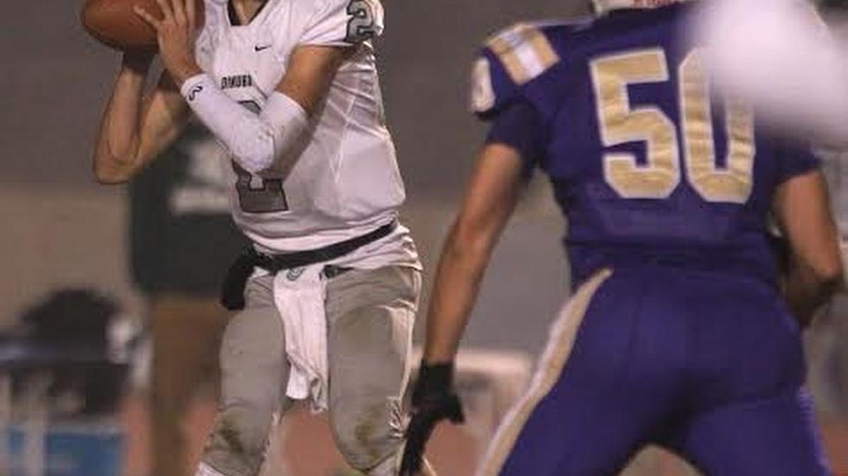 
Issac Leppke is 13-2 as Dinuba High’s starting quarterback over the past two seasons heading into the 13th-ranked Emperors game Friday, Sept. 11, 2015, at home against No. 8 Hanford.
