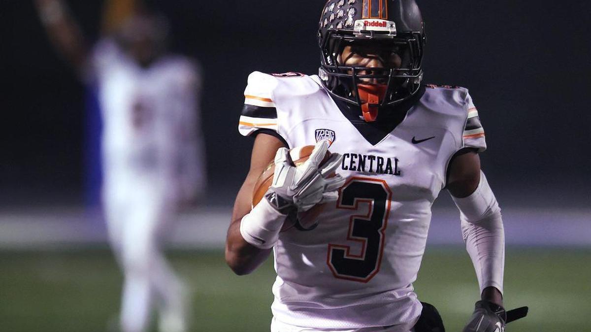 Central High’s Jeremiah Hunter runs in for a touchdown against Sierra Canyon in the state football championship held at Cerritos College Friday night, Dec. 13, 2019 in Norwalk.