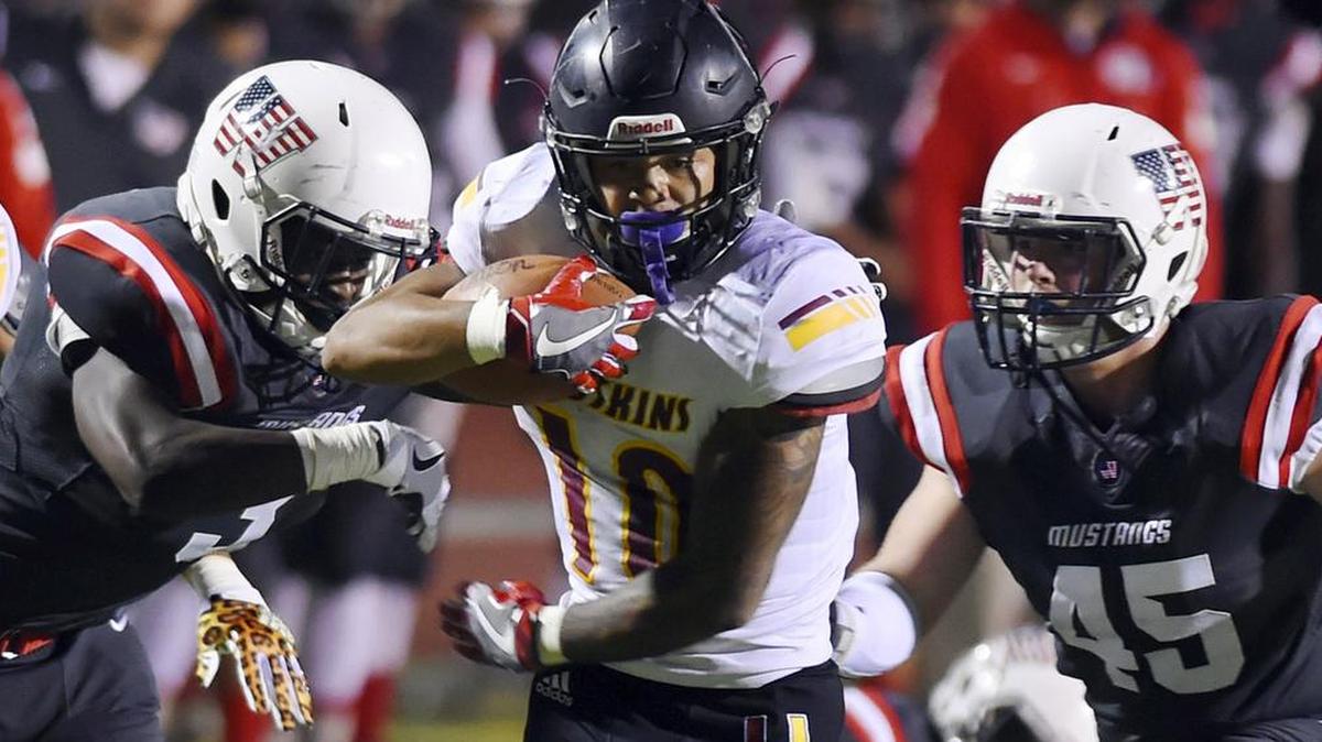 Tulare Union High running back Kazmeir Allen, shown here in a file photo, scored a school record eight touchdowns in a 61-26 win against Sunnyside to kick off the Central Section Division II playoffs.