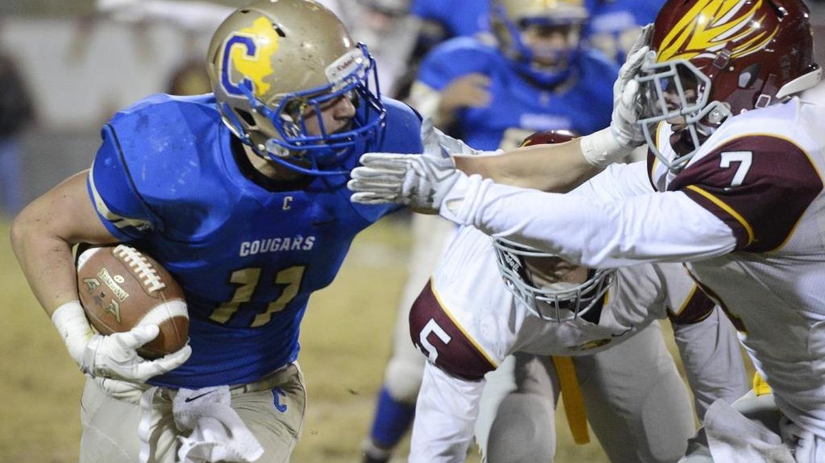 Clovis High’s Josh Hokit, left, and the rest of the Cougars are a win away from a Central Section Division I championship and an automatic berth in the state regionals. The top-seeded Cougars host No. 2 Liberty-Bakersfield on Friday.