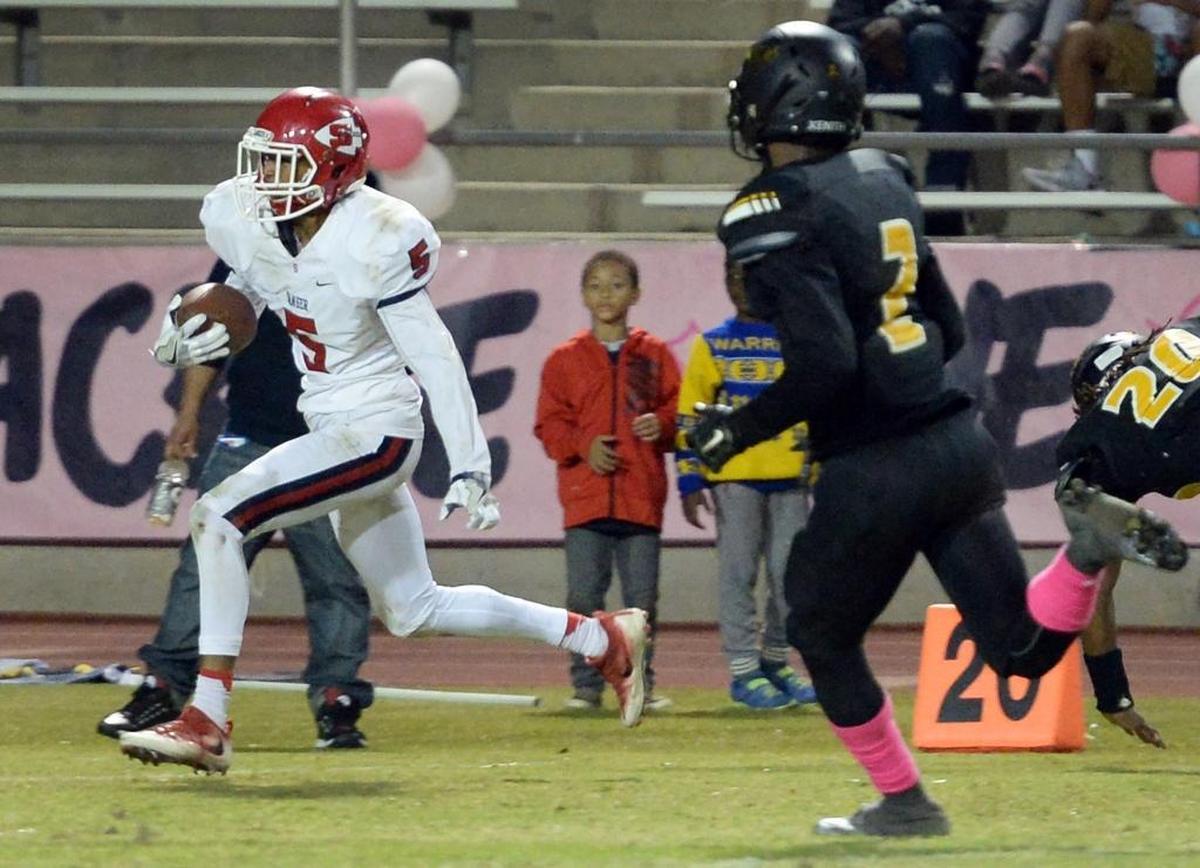 Sanger High’s Jalen Cropper sprints down the sideline en route to a touchdown against Edison in their County/Metro Athletic Conference game Friday, Oct. 21, 2016, at McLane Stadium in Fresno. Sanger will host the Tigers in 2017 on Friday, Oct. 20.