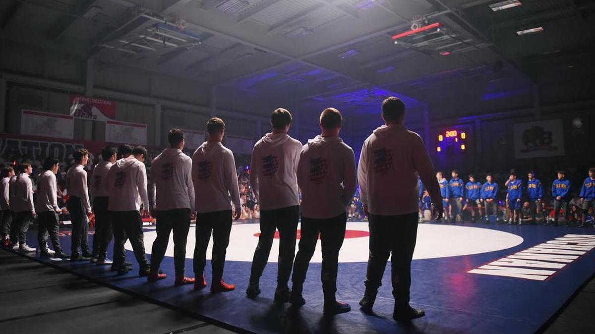 File photo of Buchanan, foreground, and Clovis, background, line up at the start of The Big One wrestling dual held Thursday, Jan. 17, 2019 in Clovis.
