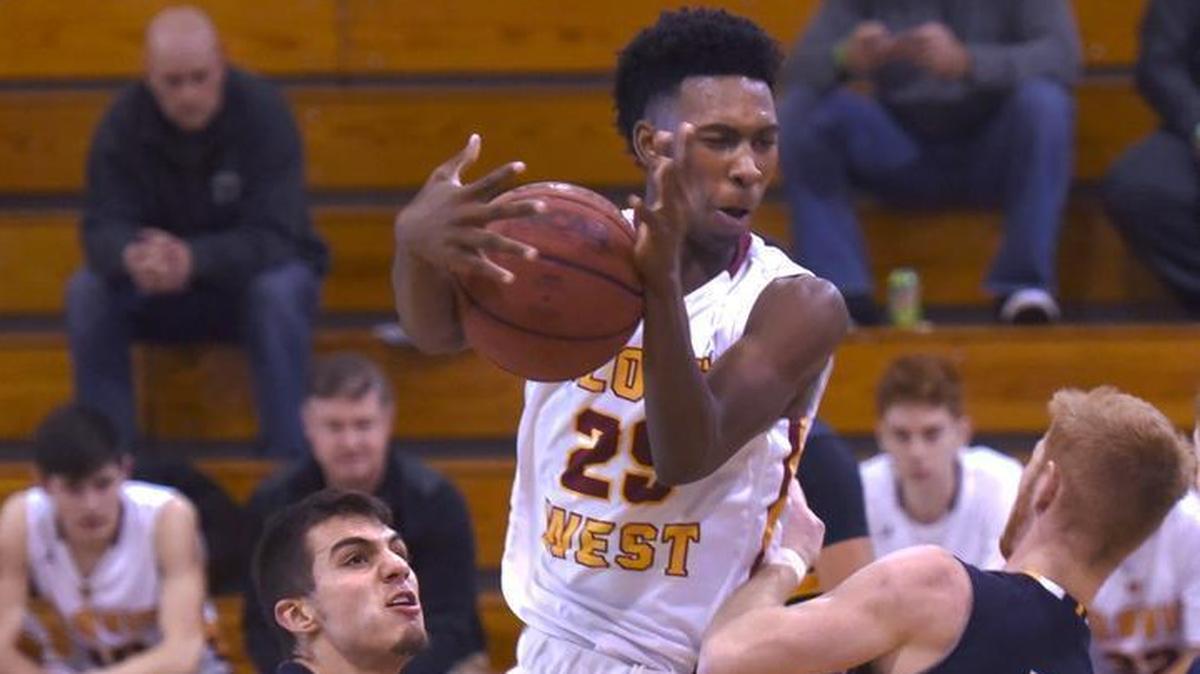 Clovis West High’s Germaun Nutt faces heavy pressure by Turlock defenders Adrian Espinoza, left, and Michael Patterson during the Holiday Hoops Classic on Wednesday December 27, 2017, at Modesto Christian. Nutt and the Golden Eagles improved to 13-1 with an 83-66 victory.
