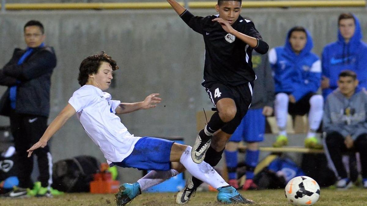 Michael Arrington, right, and the Central High boys soccer team can clinch the Tri-River Athletic Conference title with a win Tuesday against Clovis East. But the Grizzlies are likely to be seeded behind TRAC rival Buchanan for the Central Section Division I playoffs based on losses in two of three head-to-head meetings this season.