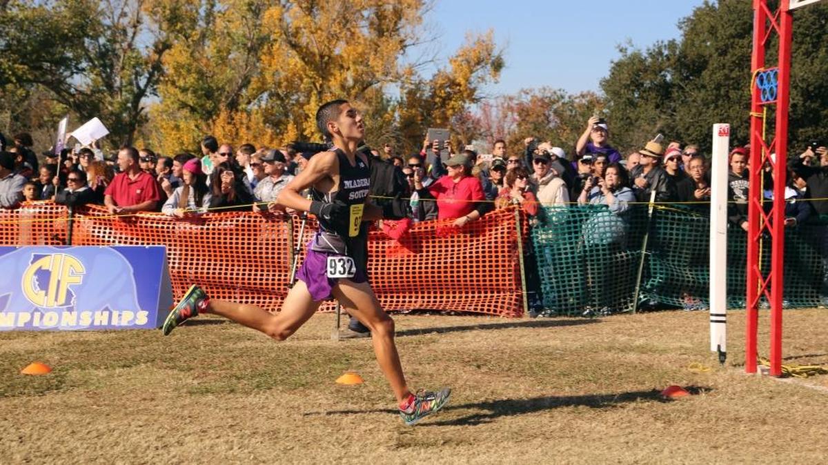 Madera South’s Miguel Villar, shown finishing 11th in the 2015 CIF State Division I cross country final, opposes a loaded field in Saturday’s Championship Boys race at the 38th Asics Clovis Invitational at Woodward Park.
