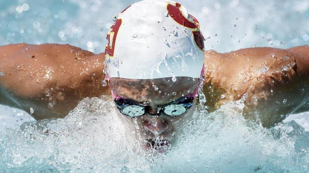 Clovis West High’s Matt Elkington swims to victory in the 100-yard butterfly at the 2016 Clovis West Invitational on Saturday. It was part of a big day for the UC Santa Barbara-bound senior, who set three meet records and broke a 23-year-old school record.