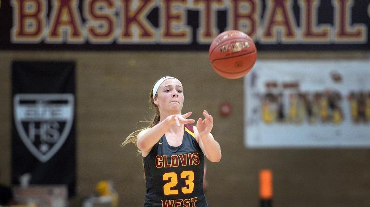 Clovis West High’s Madison Campbell passes the ball during the Golden Eagles’ game against Garces at the Central Valley Showdown tournament Thursday, Nov. 30, 2017.