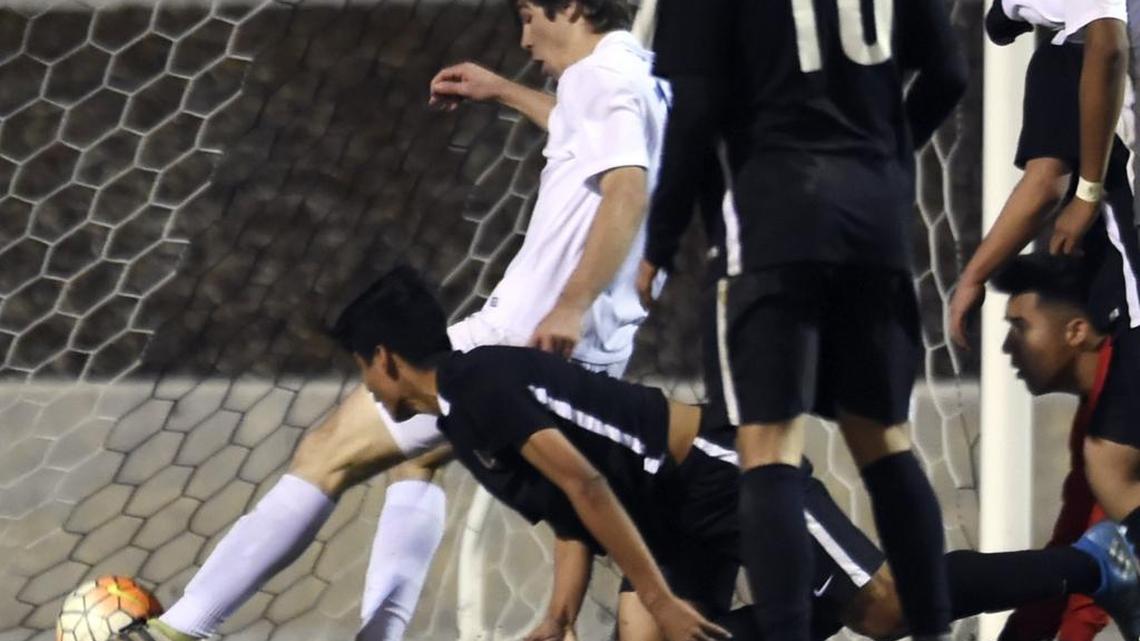 Clovis High’s Braedon Rouff was named the Tri-River Athletic Conference’s boys soccer Player of the Year after scoring 27 goals, including the one pictured, and making 10 assists for the Central Section Division I champion Cougars.