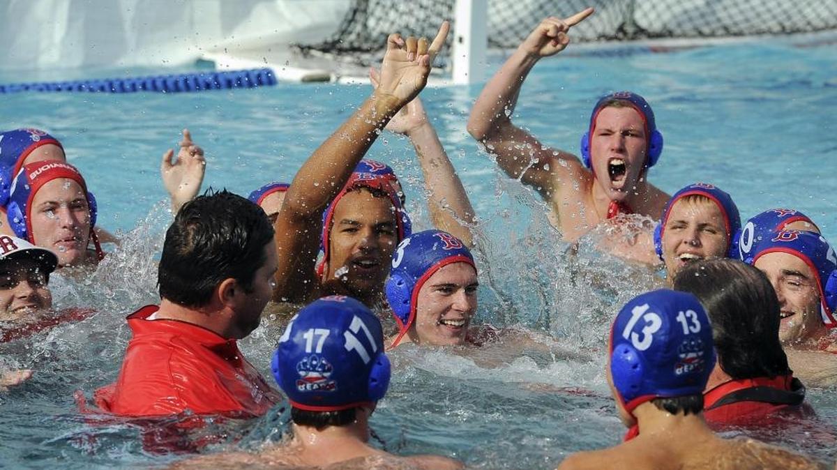 Buchanan and its coaches celebrate their 8-3 win over Clovis for the Central Section Division I boys water polo title Saturday, Nov. 19, 2016.
