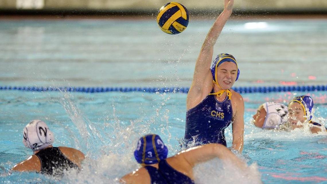 Clovis High’s Abby Mammen rises out of the water to block a Clovis North shot in a Central Section Division I girls semifinal on Wednesday. Mammen scored what proved to be the game-winner in an 8-7 victory, with Clovis West awaiting in Saturday’s final.