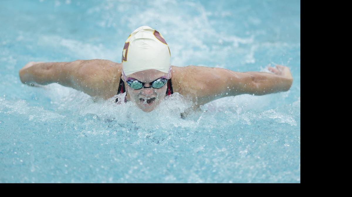 
Sklyar Elkington of Clovis West swims in her 100 yard butterfly preliminary heat during the CIF State Swimming and Diving Championships at Clovis West High Friday, May 22, 2015. 
