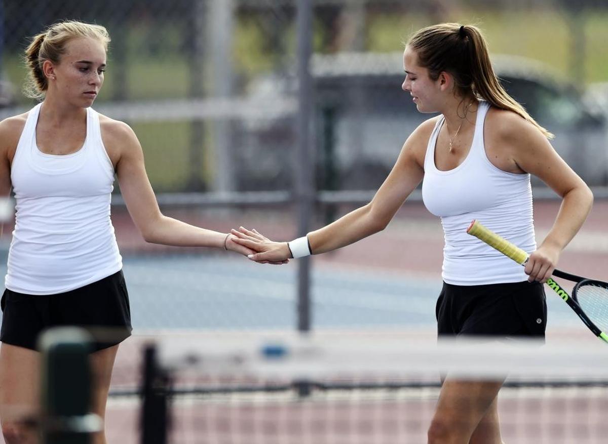 Stockdale’s Greta Krueger, left, and Erica Paradise, right, during the Central Section girls tennis doubles championship Saturday, Nov. 4, 2017 in Clovis.
