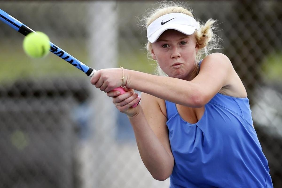 Clovis West’s Janie Ellis returns to Clovis North’s Tatiana Ruiz during the Central Section girls tennis singles championship Saturday, Nov. 4, 2017 in Clovis. Ellis won in three sets.